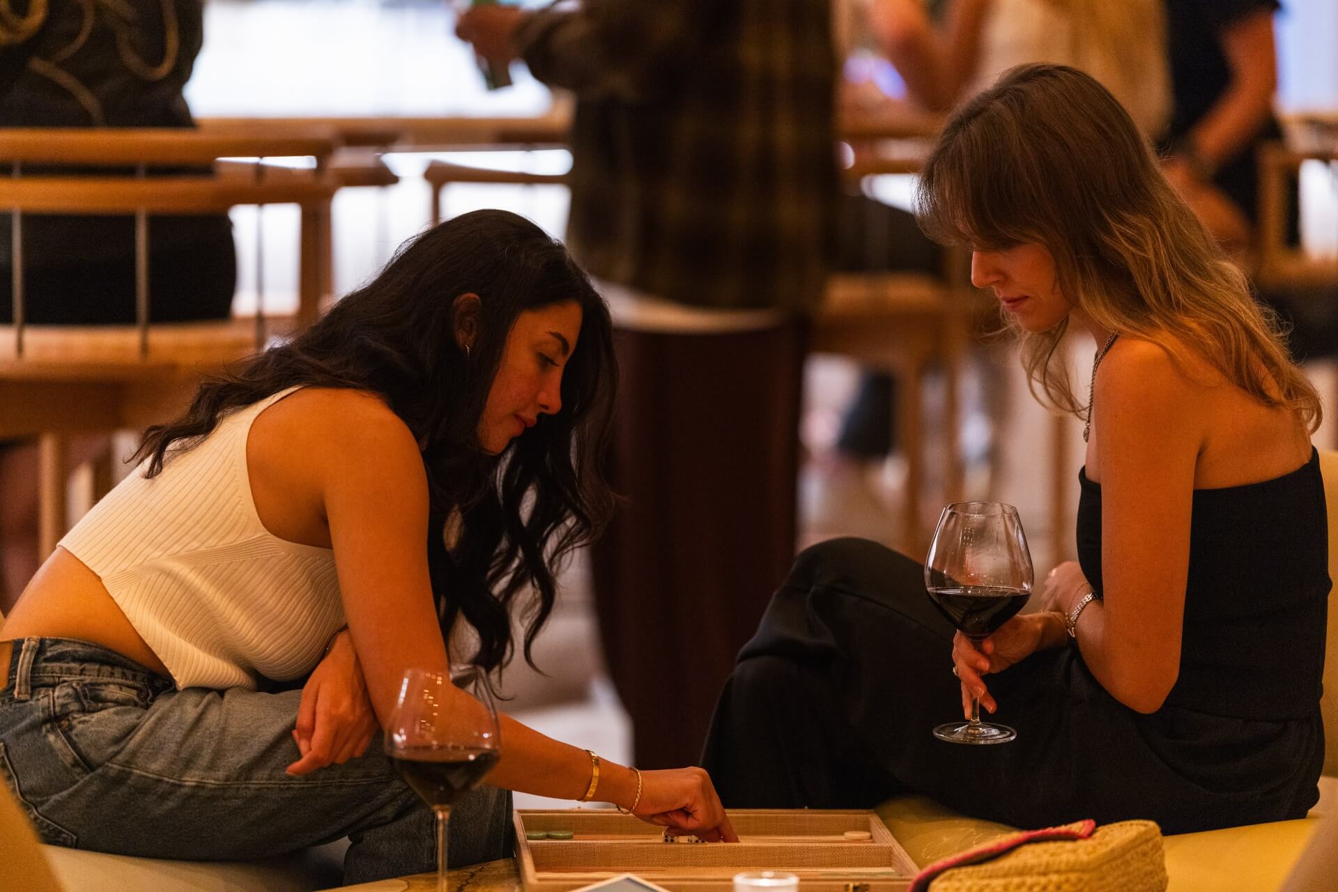 Women playing backgammon